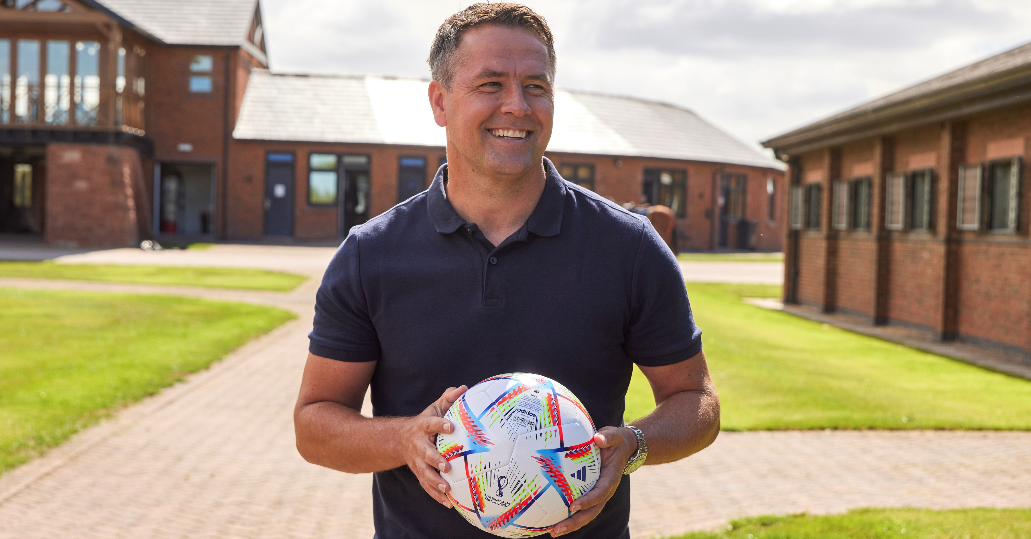 Michael Owen Outside Manor House Stables Holding A Football